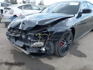 2014 Maserati Ghibli S Q4 with VIN ZAM57RTA0E1101059, listed as a IAAI auction lot 42121292 with 107,901 mi miles and . Bid and sale history available at DreamBid. Image 6.