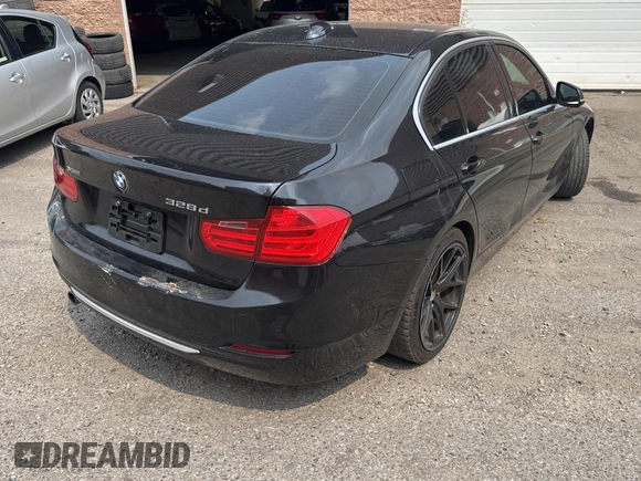 2014 BMW 3 Series 328d xDrive with VIN WBA3D5C52EKX99262, listed as a Copart auction lot 65983355 with 292,446 mi miles and Clean title. Bid and sale history available at DreamBid. Image 4.