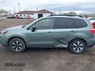 2017 Subaru Forester with VIN JF2SJABC3HH442661, listed as a IAAI auction lot 42136851 with 89,791 mi miles and . Bid and sale history available at DreamBid. Image 14.