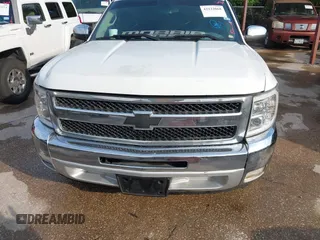 2013 Chevrolet Silverado 1500 LT with VIN 1GCRCSE05DZ366248, listed as a IAAI auction lot 42122068 with 233,316 mi miles and . Bid and sale history available at DreamBid. Image 12.