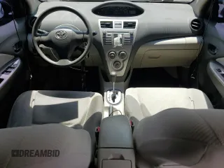2009 Toyota Yaris z VIN JTDBT903X91297199, wystawiony jako Copart lot #57088615 z przebiegiem 161 170 mil mil oraz Szkody całkowita. Historia ofert i sprzedaży dostępna na DreamBid. Obrazek 8.