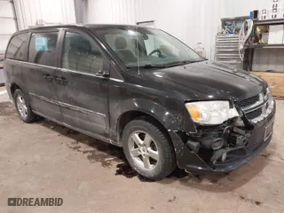 2012 Dodge Grand Caravan Crew with VIN 2C4RDGDG3CR317616, listed as a IAAI auction lot 41609868 with 214,706 mi miles. Bid and sale history available at carsss.com. Image 1.