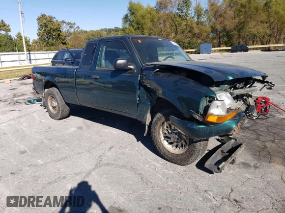 1999 Ford Ranger XLT with VIN 1FTYR14X1XPA61459, listed as a Copart auction lot 76380064 with 292,940 mi miles and Salvage Title. Bid and sale history available at DreamBid. Image 4.