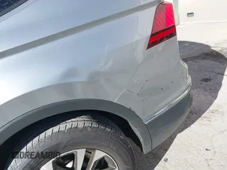 2024 Volkswagen Tiguan S с VIN 3VVFB7AX3RM045163, выставлен на аукционе IAAI как лот 41280613 с пробегом 7 705 миль миль и . История ставок и продаж доступна на DreamBid. Изображение 18.