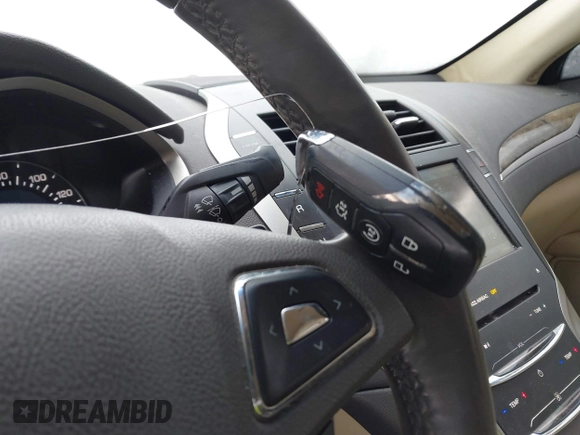 2015 Lincoln MKZ с VIN 3LN6L2JK2FR603436, выставлен на аукционе IAAI как лот 41598218 с пробегом 107 059 миль миль и . История ставок и продаж доступна на DreamBid. Изображение 11.