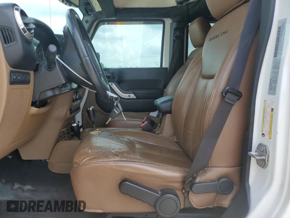 2016 Jeep Wrangler Unlimited Rubicon с VIN 1C4BJWFGXGL349057, выставлен на аукционе Copart как лот 61608945 с пробегом 118 200 миль миль и Списание • Salvage title. История ставок и продаж доступна на DreamBid. Изображение 7.