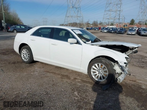 2012 Chrysler 300 with VIN 2C3CCAAG6CH116930, listed as a IAAI auction lot 41940820 with 208,279 mi miles. Bid and sale history available at carsss.com. Image 1.