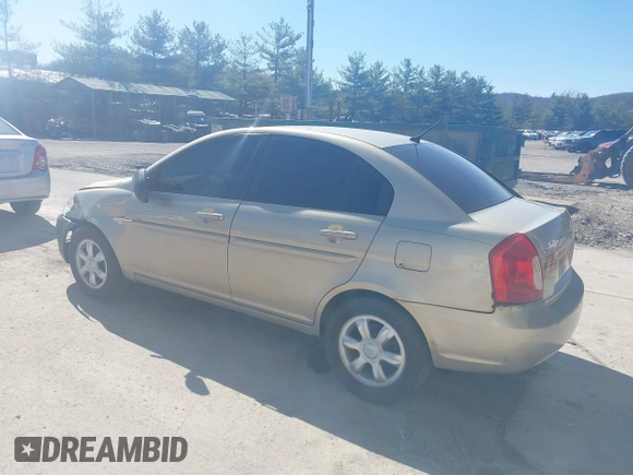 2007 Hyundai Accent GLS with VIN KMHCN46CX7U093034, listed as a IAAI auction lot 41855739 with 152,449 mi miles. Bid and sale history available at carsss.com. Image 3.