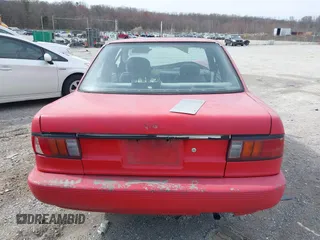 1993 Nissan Sentra z VIN 1N4EB32H7PC770697, wystawiony jako IAAI lot #41727754 z przebiegiem 210 152 mil mil oraz . Historia ofert i sprzedaży dostępna na DreamBid. Obrazek 16.