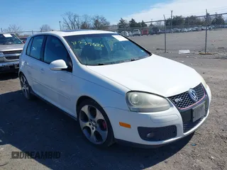 2009 Volkswagen GTI z VIN WVWHV71K69W121218, wystawiony jako IAAI lot #41739628 z przebiegiem 129 988 mil mil oraz . Historia ofert i sprzedaży dostępna na DreamBid. Obrazek 1.
