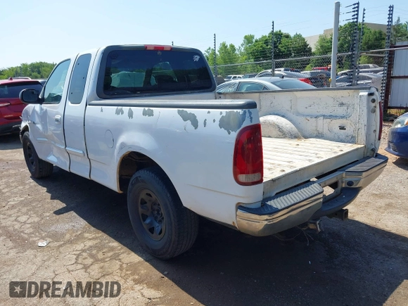 2001 Ford F-150 z VIN 1FTPX17LX1KB15016, wystawiony jako IAAI lot #42320637 z przebiegiem 567 424 mil mil oraz . Historia ofert i sprzedaży dostępna na DreamBid. Obrazek 3.