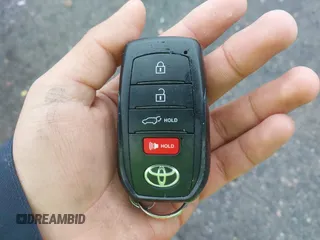 2024 Toyota Highlander XLE z VIN 5TDAAAA59RS011154, wystawiony jako IAAI lot #41243314 z przebiegiem 28 555 mil mil oraz . Historia ofert i sprzedaży dostępna na DreamBid. Obrazek 11.