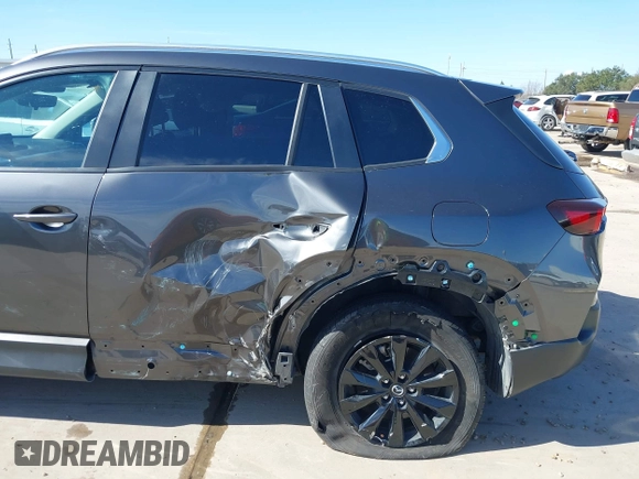 2023 Mazda CX-50 S Select with VIN 7MMVABAM5PN150568, listed as a IAAI auction lot 41464996 with 62,612 mi miles and . Bid and sale history available at DreamBid. Image 6.