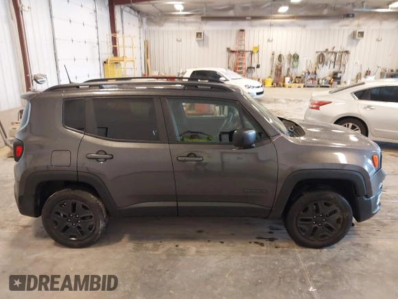 2018 Jeep Renegade Sport z VIN ZACCJBABXJPH72202, wystawiony jako IAAI lot #42538894 z przebiegiem 49 877 mil mil oraz . Historia ofert i sprzedaży dostępna na DreamBid. Obrazek 13.