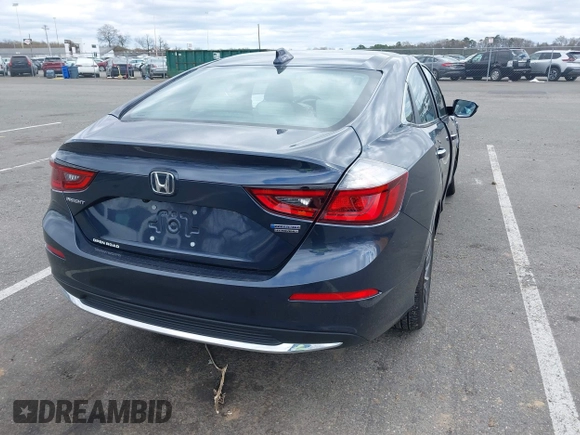 2022 Honda Insight Touring with VIN 19XZE4F90NE007552, listed as a IAAI auction lot 42038471 with 7,904 mi miles and . Bid and sale history available at carsss.com. Image 4.