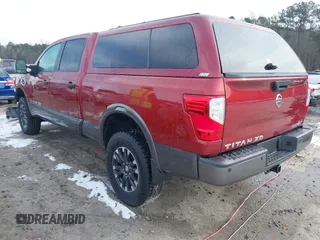 2016 Nissan Titan XD PRO-4X with VIN 1N6BA1F47GN515917, listed as a IAAI auction lot 41355875 with 95,793 mi miles. Bid and sale history available at carsss.com. Image 3.