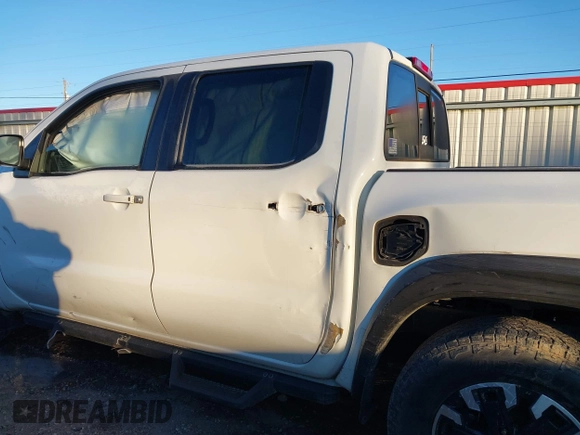 2022 Nissan Frontier SV with VIN 1N6ED1EJ6NN610123, listed as a IAAI auction lot 41261773 with 64,812 mi miles and . Bid and sale history available at DreamBid. Image 14.