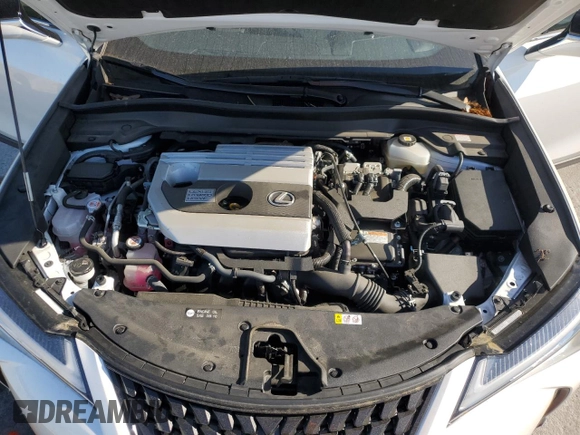 2021 Lexus UX 250h с VIN JTHP9JBH5M2041312, выставлен на аукционе Copart как лот 50294735 с пробегом 7 910 миль миль и Списание • Salvage title. История ставок и продаж доступна на DreamBid. Изображение 11.