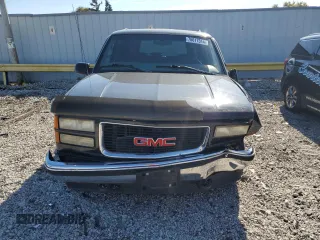 1997 GMC Suburban z VIN 3GKEC16R7VG500916, wystawiony jako Copart lot #76617314 z przebiegiem 271 867 mil mil oraz Nie do naprawy • Non repairable. Historia ofert i sprzedaży dostępna na DreamBid. Obrazek 5.