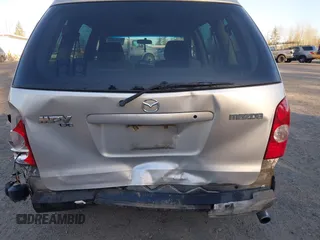 2003 Mazda MPV LX with VIN JM3LW28J130349958, listed as a IAAI auction lot 41692463 with 156,166 mi miles and . Bid and sale history available at carsss.com. Image 6.