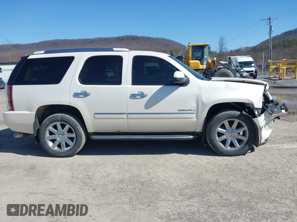 2011 GMC Yukon Denali with VIN 1GKS2EEF8BR237643, listed as a IAAI auction lot 41811822 with 134,309 mi miles. Bid and sale history available at carsss.com. Image 13.