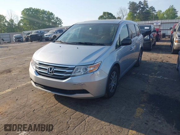 2013 Honda Odyssey EX-L with VIN 5FNRL5H6XDB084016, listed as a IAAI auction lot 42044300 with 156,296 mi miles and . Bid and sale history available at carsss.com. Image 2.