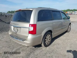 2015 Chrysler Town & Country Touring with VIN 2C4RC1BG7FR583213, listed as a IAAI auction lot 42089075 with 265,629 mi miles. Bid and sale history available at carsss.com. Image 4.