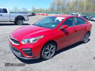 2021 Kia Forte LXS with VIN 3KPF24AD6ME299861, listed as a IAAI auction lot 42146614 with 54,896 mi miles. Bid and sale history available at carsss.com. Image 2.
