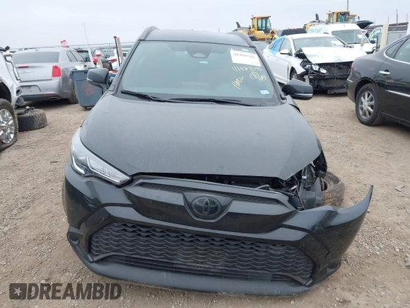 2023 Toyota Corolla Cross Hybrid S with VIN 7MUFBABG6PV010999, listed as a IAAI auction lot 41489541 with 14,707 mi miles and . Bid and sale history available at DreamBid. Image 13.