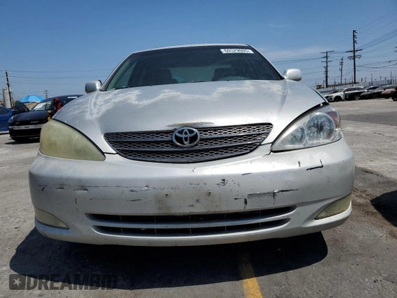 2004 Toyota Camry LE with VIN 4T1BE32K94U300544, listed as a Copart auction lot 60529005 with 223,940 mi miles and Clean title. Bid and sale history available at DreamBid. Image 5.