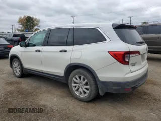 2019 Honda Pilot LX with VIN 5FNYF5H1XKB021356, listed as a Copart auction lot 83003124 with 154,493 mi miles and Salvage Title. Bid and sale history available at carsss.com. Image 2.