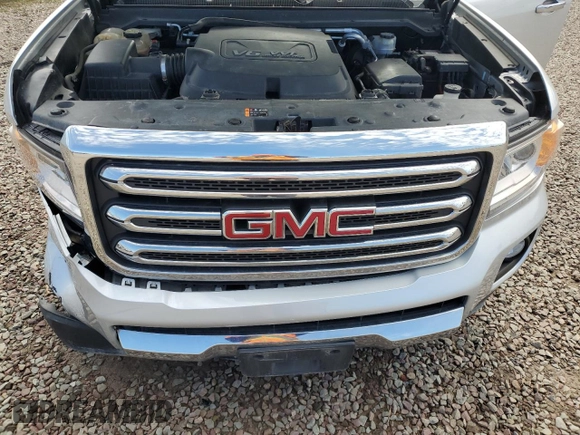 2015 GMC Canyon 4WD SLT with VIN 1GTG6CE3XF1146667, listed as a Copart auction lot 51581855 with 89,924 mi miles and Salvage Title. Bid and sale history available at carsss.com. Image 11.