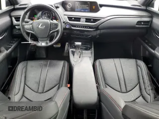2020 Lexus UX 250h F Sport with VIN JTHR9JBH1L2026913, listed as a Copart auction lot 53477275 with 56,518 mi miles and Salvage title. Bid and sale history available at DreamBid. Image 8.