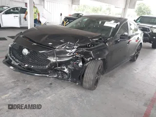 2024 Mazda 3 S Select Sport with VIN 3MZBPABM1RM408945, listed as a IAAI auction lot 42398805 with 42,283 mi miles and . Bid and sale history available at DreamBid. Image 2.