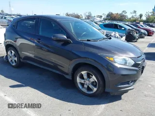 2017 Honda HR-V EX with VIN 3CZRU5H50HG703379, listed as a IAAI auction lot 41965079 with 82,906 mi miles. Bid and sale history available at carsss.com. Image 1.
