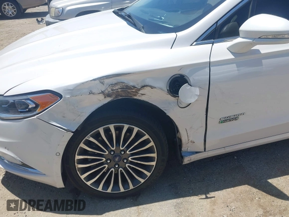 2017 Ford Fusion Titanium z VIN 3FA6P0SU0HR329224, wystawiony jako IAAI lot #42291605 z przebiegiem 176 728 mil mil oraz . Historia ofert i sprzedaży dostępna na DreamBid. Obrazek 6.