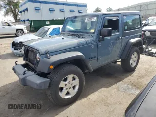2015 Jeep Wrangler Freedom Edition with VIN 1C4AJWAG8FL650931, listed as a Copart auction lot 58209625 with 104,560 mi miles and Salvage title. Bid and sale history available at DreamBid. Image 1.