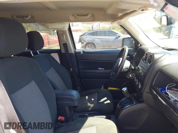 2014 Jeep Patriot Latitude with VIN 1C4NJPFBXED737646, listed as a IAAI auction lot 41832412 with 130,000 mi miles and . Bid and sale history available at carsss.com. Image 5.