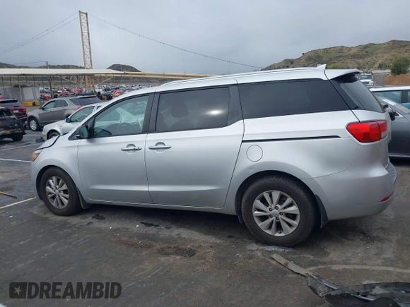 2016 Kia Sedona LX with VIN KNDMB5C13G6212492, listed as a IAAI auction lot 41793029 with 99,176 mi miles. Bid and sale history available at carsss.com. Image 13.