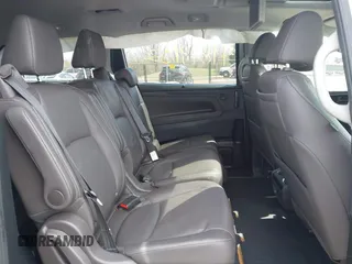 2022 Honda Odyssey Touring with VIN 5FNRL6H80NB039904, listed as a IAAI auction lot 41849132 with Not Provided miles and . Bid and sale history available at DreamBid. Image 8.