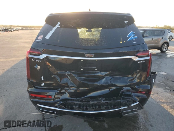 2020 Cadillac XT6 FWD Premium Luxury with VIN 1GYKPCRS2LZ183664, listed as a Copart auction lot 74754244 with 42,532 mi miles and Salvage Title. Bid and sale history available at carsss.com. Image 6.
