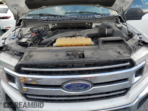 2018 Ford F-150 XL z VIN 1FTFW1EGXJFA01627, wystawiony jako Copart lot #62281115 z przebiegiem 216 250 mil mil oraz Szkoda całkowita • Salvage title. Historia ofert i sprzedaży dostępna na DreamBid. Obrazek 11.