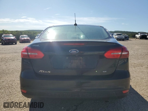 2017 Ford Focus SE with VIN 1FADP3F25HL265326, listed as a Copart auction lot 61384685 with 65,808 mi miles and Clean title. Bid and sale history available at DreamBid. Image 6.