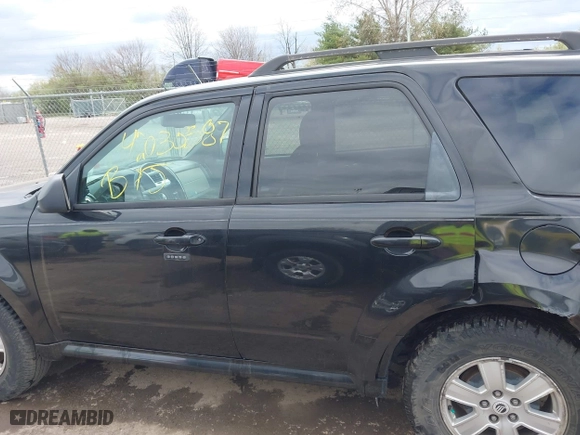 2011 Mercury Mariner with VIN 4M2CN8B7XBKJ01717, listed as a IAAI auction lot 42030587 with 115,766 mi miles. Bid and sale history available at carsss.com. Image 14.