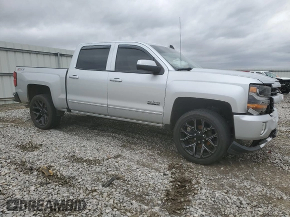 2017 Chevrolet Silverado 1500 LT with VIN 3GCUKREC0HG431285, listed as a Copart auction lot 49585755 with 134,008 mi miles and Salvage Title. Bid and sale history available at DreamBid. Image 4.
