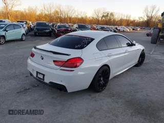 2015 BMW 6 Series 640i with VIN WBA6A0C54FGB53785, listed as a IAAI auction lot 40612020 with 67,524 mi miles and . Bid and sale history available at DreamBid. Image 4.