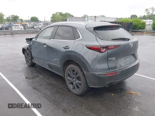 2023 Mazda CX-30 S Carbon Edition with VIN 3MVDMBCM9PM574358, listed as a IAAI auction lot 42105931 with 55,975 mi miles and . Bid and sale history available at DreamBid. Image 3.