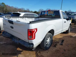 2016 Ford F-150 XL with VIN 1FTMF1C85GKE69350, listed as a IAAI auction lot 41690906 with 162,338 mi miles. Bid and sale history available at carsss.com. Image 4.