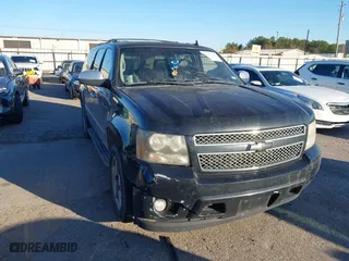 2011 Chevrolet Suburban LTZ with VIN 1GNSCKE00BR353106, listed as a IAAI auction lot 41393001 with 252,968 mi miles. Bid and sale history available at carsss.com. Image 1.