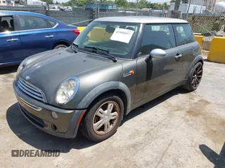 2006 MINI Hardtop with VIN WMWRC33566TJ76689, listed as a IAAI auction lot 42408697 with 153,382 mi miles and . Bid and sale history available at DreamBid. Image 2.